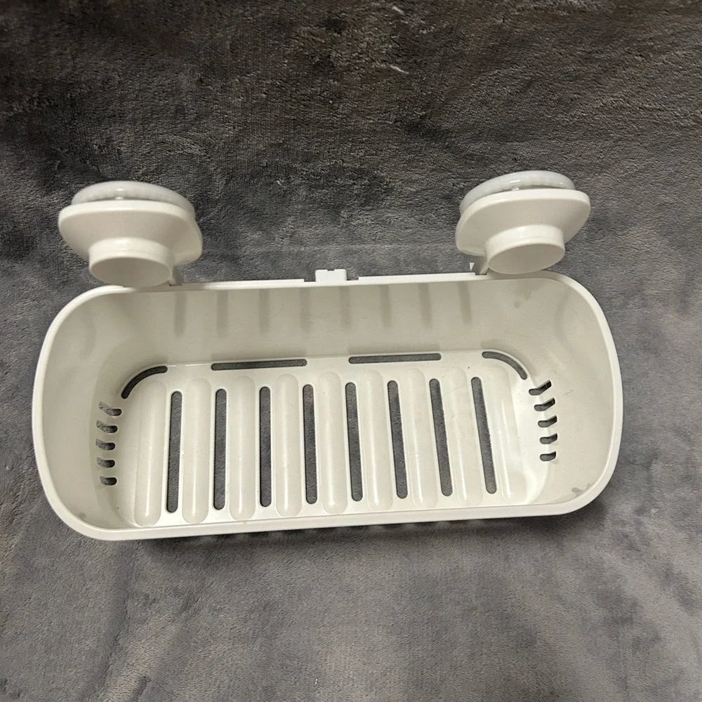 White plastic shower holder caddy basket with suction cup